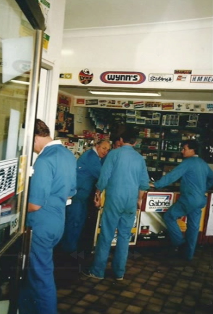 Workshop crew at the original parts counter
